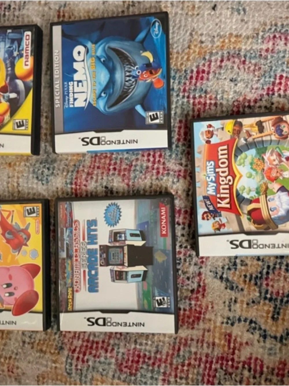 Nintendo Pink DS Lite Handheld with Five Nintendo DS Game Cases